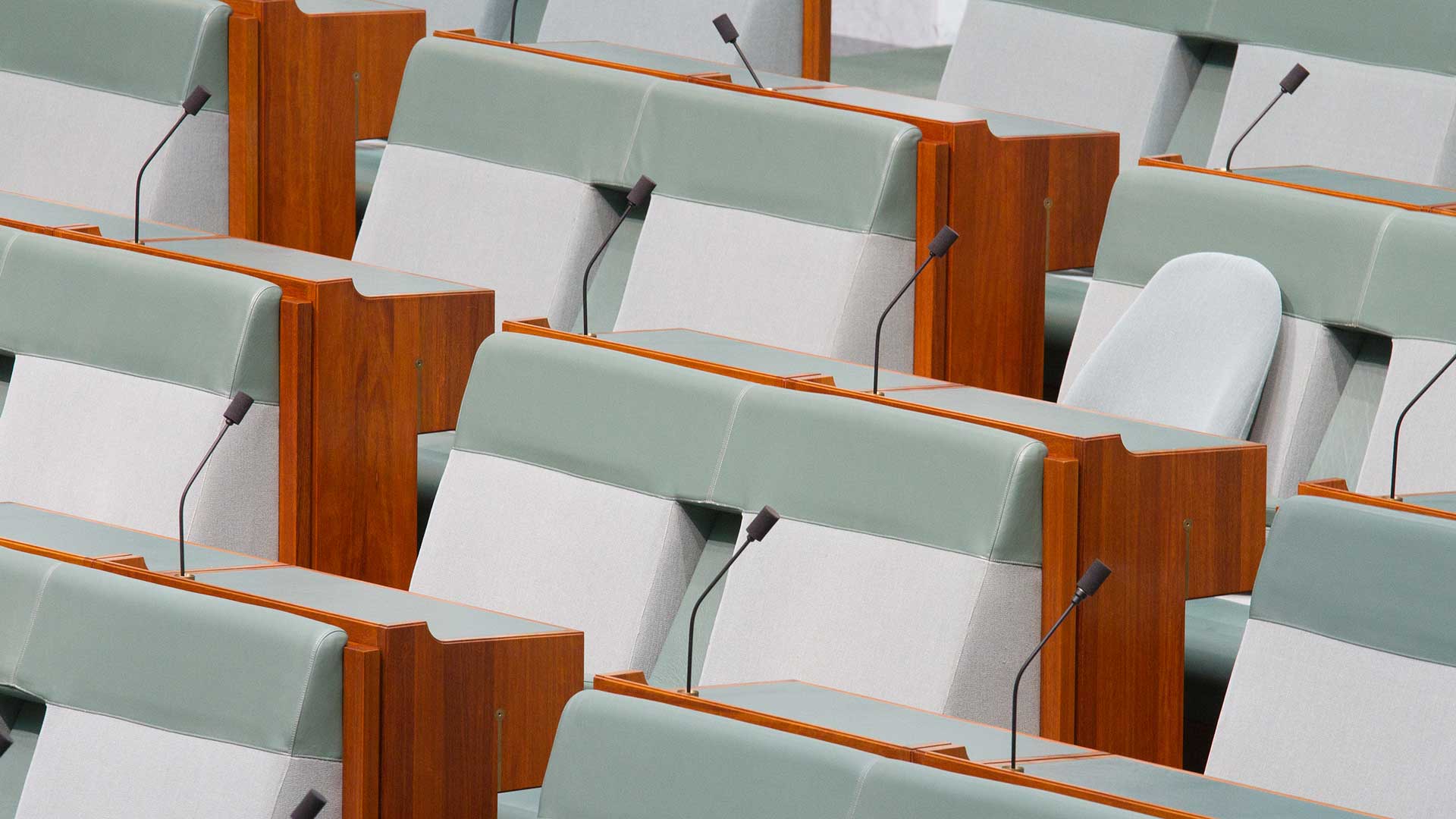 Empty green chairs in the House of Representatives