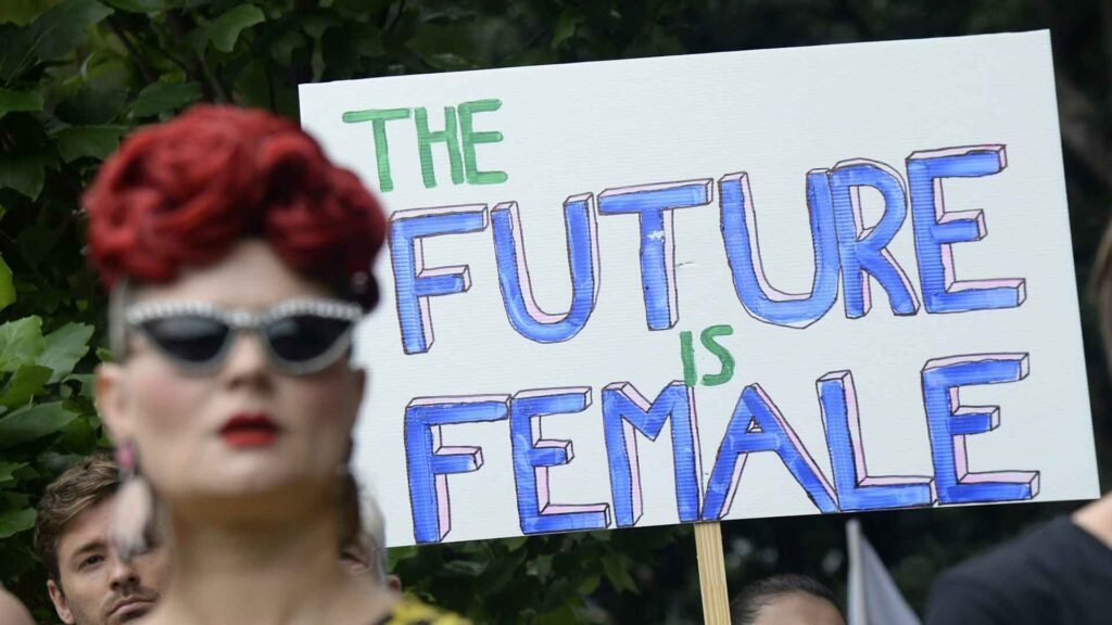 Close up of a placard at a rally with the words "THE FUTURE IS FEMALE"