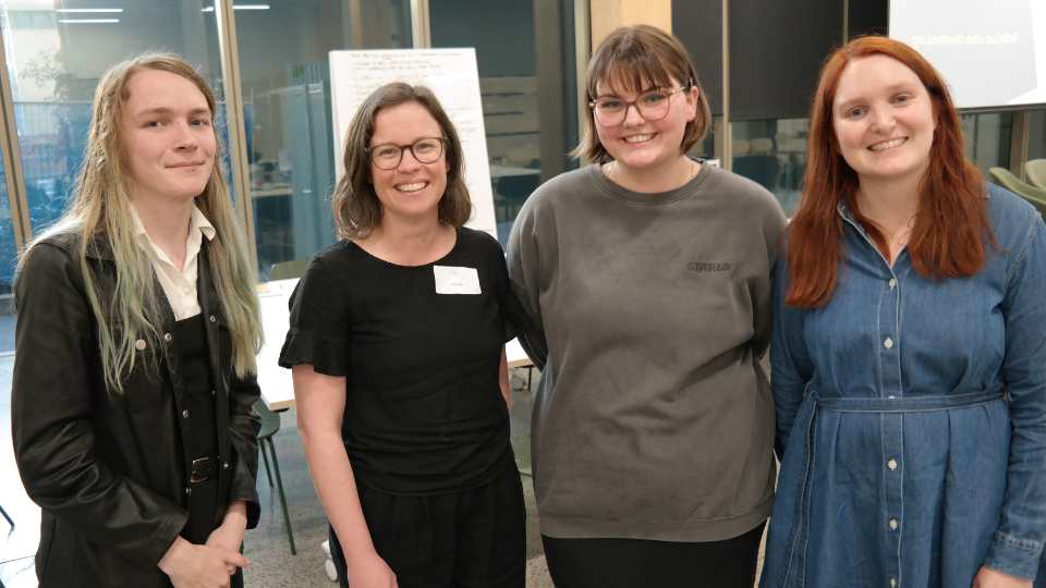 Four smiling women