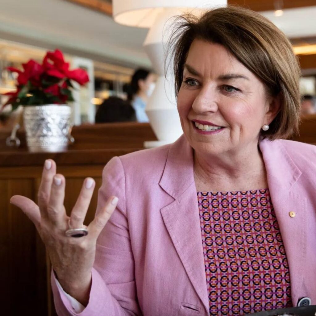 Photo of anna Bligh wearing a pink blazer