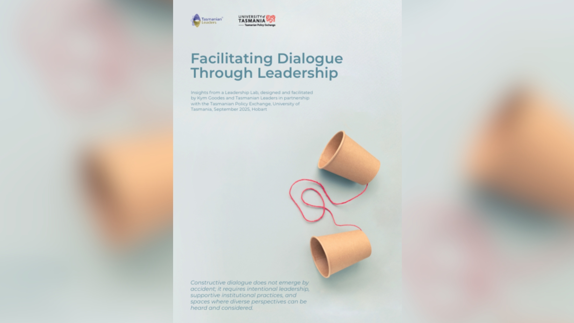 cover of the report Facilitating dialogue Through Leadership, showing two paper cups linked together by a piece of red strong